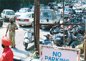 VIP vehicles parked in front of houses in Sector 9