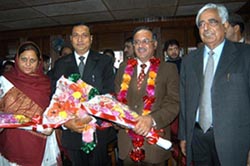 Ms Kanta Andotra (Congress), Mr Sham Lal Sharma (Congress), Mr Tariq Hamid Qarra (PDP), and the Jammu and Kashmir Chief Minister, Mufti Mohammad Sayeed, after the oath-taking ceremony at Srinagar on Monday. 