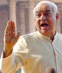 Governor of Rajasthan Madan Lal Khurana talks to mediapersons after submitting his resignation 