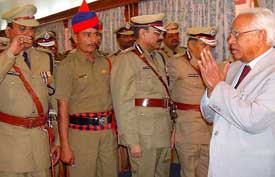 Haryana Governor A.R. Kidwai greets recipients of Presidents Medals on the occasion of Police Investiture Ceremony at Haryana Raj Bhawan in Chandigarh