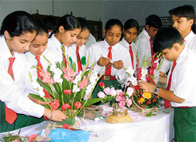 Students of New Senior Secondary School, Sarabha Nagar, participate in a flower arrangement competition held in Ludhiana