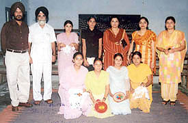 Winners of an embroidery competition held in Samrala on Wednesday.
