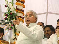 Union Railway Minister Laloo Prasad Yadav addresses a gathering at the annual Agroha dham fair on Thursday.