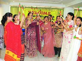 Members of the Saraswati Ladies Club perfom dandia at a function in Ludhiana