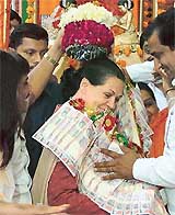 Ms Sonia Gandhi, Congress President, is greeted by party workers on the occasion of Maharishi Valmiki Jayanti at her residence in New Delhi