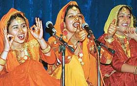 Girls sing sithnis at the Youth and Heritage Festival at DAV College, Chandigarh