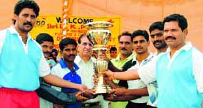 Andhra Pradesh circle team members with the overall trophy, they won in the 20th All-India Postal Athletics and Cycling Championship at Punjab Agricultural University, Ludhiana