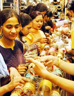 Women buy bangles on the eve of Karva Chauth in Ludhiana