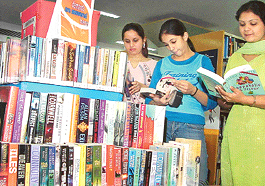 Readers at the British Library, which is exhibiting a host of books to cater to everyones interest. 