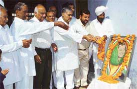 Congress workers pay homage to former Prime Minister Indira Gandhi on her death anniversary
