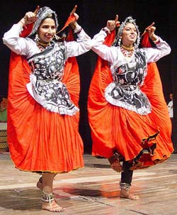 Artistes perform at the state-level function on the eve of Haryana Day in Kurukshetra on Sunday