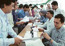 Income tax payers submit forms at Sector 17, Chandigarh, on Monday. 
