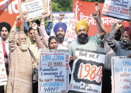 Activists under the banner of Lok Raj Sangathan, demanding justice for the victims of 1984 anti-Sikh carnage, at Jantar Mantar in the Capital on Monday.