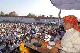 Senior Congress leader Bhupinder Singh Hooda addresses a rally at Bapoli village in Samalakha, Panipat, on Monday