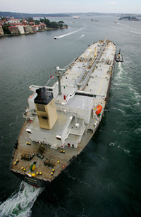 A Cypriot-registered crude oil tanker, "Kaymar", prepares to depart from an oil refinery in Sydney Harbour on Tuesday. US oil prices remained below $50 a barrel on Tuesday
