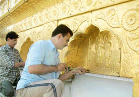 Gilding work in progress at Durgiana Temple