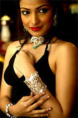 A model poses with jewellery during a fashion show by designer Shehzad Zaveri