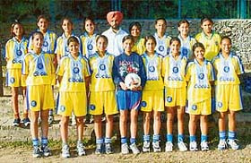 Winning soccer team of St Stephens School, Sector 45, Chandigarh, with its coach