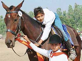 Apurv Gupta and Rajat Ghirra (astride), both aged 10, at the Chandigarh Horse Show