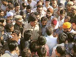 The police had a tough time controlling the crowd that had gathered at Matka Chowk on the Ambala-Poanta Sahib road, Jagadhri, following the death of three schoolchildren on Wednesday.