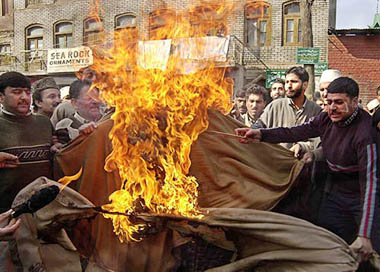 Kashmiri Wazas (traditional chefs) set ablaze certificates and shawls given by the government in protest against its order to limit the number of guests and the quantity of dishes for marriage ceremonies.