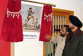 Mohinder Singh Gill, a former Olympian, looks at his portrait that was unveiled at the Reflexions Health Club in Majestic Park Plaza, Ludhiana