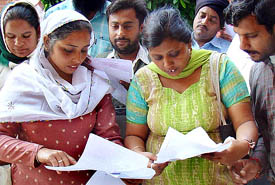 Candidates being handed over appointment letters on compassionate grounds in Chandigarh on Wednesday.