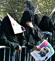 Women wait for the funeral procession of Sheikh Zayed bin Sultan al-Nahayan, at al Musafa in Abu Dhabi on Wednesday