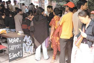 A long queue outside a polling booth in JNU