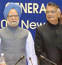 The Prime Minister, Dr Manmohan Singh, with the Union Minister for Home, Mr Shivraj Patil, at the DGPs/IGPs conference in New Delhi on Thursday.