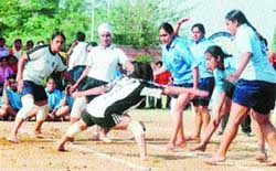 A Jalandhar raider being checked by Ludhiana players during a kabaddi match in the Inter-Polytechnic Kabaddi Tournament in Ludhiana