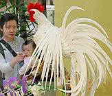 A rooster made of confectionary in Japanese-style is displayed at Matsuzakaya department store in Tokyo on Friday. The artefact, which uses 30 kg of sugar, will be displayed at the department store until Tuesday next.