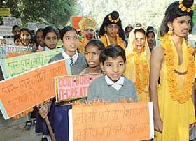 Students of Government Model High School, Sector 20-D take part in an anti-crackers rally in Chandigarh