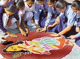 Students participate in rangoli-making competition organised by the North Zone Cultural Centre at Kalagram in Chandigarh