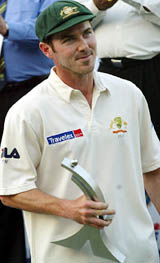 Australias Damien Martyn holds the Man-of-the-Series trophy during the awards ceremony in Mumbai
