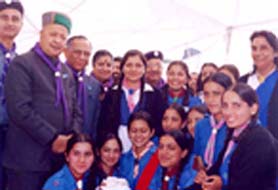 Mr V.S. Kokje, Governor, and Mr Virbhadra Singh, Chief Minister of Himachal Pradesh, with the winner students on the occasion of Scouts and Guides Flag Day in Shimla on Sunday.