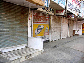 Shutters pulled down in protest against the murder of DCC president Ramesh Masta in Bhiwani on Monday