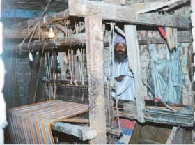Khes and durries have given a boost to @@the handloom industry. 