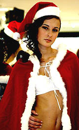 A model wears a Santa Claus-inspired outfit during a lingerie fashion show in Seoul 