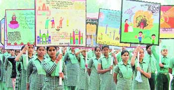 Students of Green Land school hold rally against crackers in Ludhiana on Thursday