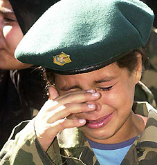 A Palestinian girl mourns the death of Yasser Arafat in Ain al-Hilweh refugee camp in south Lebanon