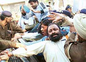 Activists of the Vishva Hindu Parishad and the Bajrang Dal stage a protest in Chandigarh on Saturday