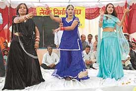 Girls dance on Bollywood tunes during Vishwakarma Day celebrations at Rajiv Colony in Panchkula