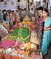 Devotees participating in Govardhan Maharaj pooja at Aryapura in the Capital.
