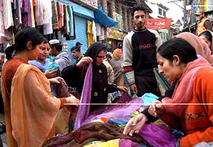 To celebrate Id, Muslims in the Kashmir valley throng local markets to buy gifts on Saturday.