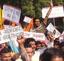 VHP activists hold a demonstration against the arrest of Jagadguru Shankaracharya Swami Jayendra Saraswati at Jantar Mantar in New Delhi 