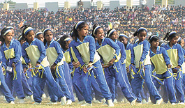 Schoolchildren performing a dance show on the occasion of Children's Day celebration at Ambedkar Stadium in the Capital on Sunday. 