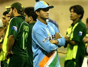 Staring at the face of defeat: Captain Sourav Ganguly watches the prize distribution ceremony after India was defeated by Pakistan in the BCCI platinum jubilee ODI on November 13