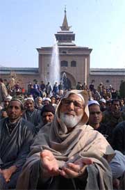 People offer Id prayers at Jamia Masjid in Srinagar on Sunday