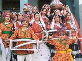 Students of S.A.N. Jain Senior Secondary School prepare to participate in the annual prize distribution function of the school held in Ludhiana on Sunday